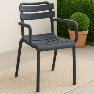 Dark grey bistro plastic chair with slatted back and armrests placed in a stylish outdoor café setting.