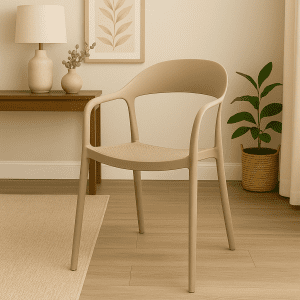 Beige bistro plastic chair with armrests in a modern indoor café setting.