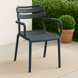 Black bistro plastic chair with armrests in a stylish café setting.