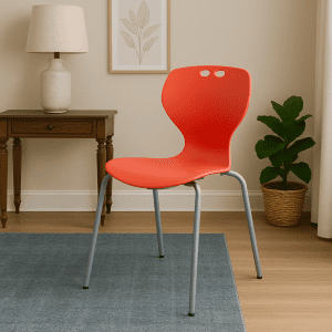 Red bistro plastic chair with metal legs in a modern home interior.
