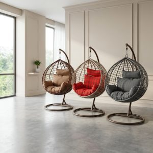 Rattan Hanging Egg Chair with freestanding metal frame and padded cushions