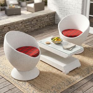 A premium 2-Seater Rattan Coffee Set featuring two white hand-woven synthetic wicker egg-shaped capsule chairs with red and black plaid seat cushions, paired with a matching white woven two-tier rectangular coffee table topped with a clear tempered glass surface.