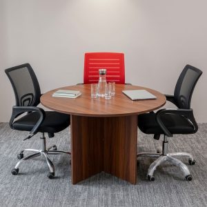 A premium 1.2M Round Meeting Table featuring a thick circular walnut wood top supported by a heavy-duty matching wooden cross-panel pedestal base.