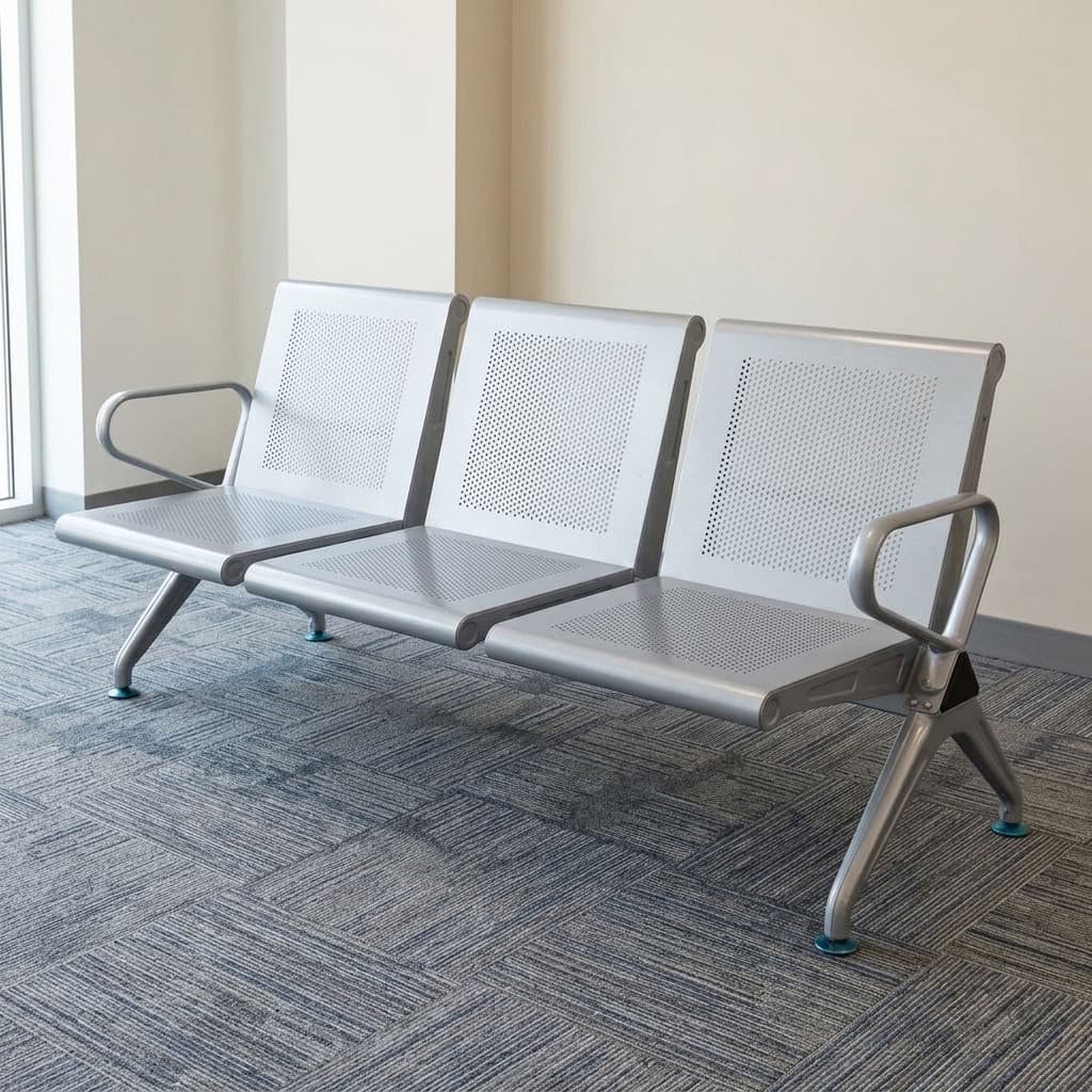 A premium metallic silver 3-Link Heavy Duty Waiting Bench featuring a three-seat perforated steel design, side armrests, and arched support legs.