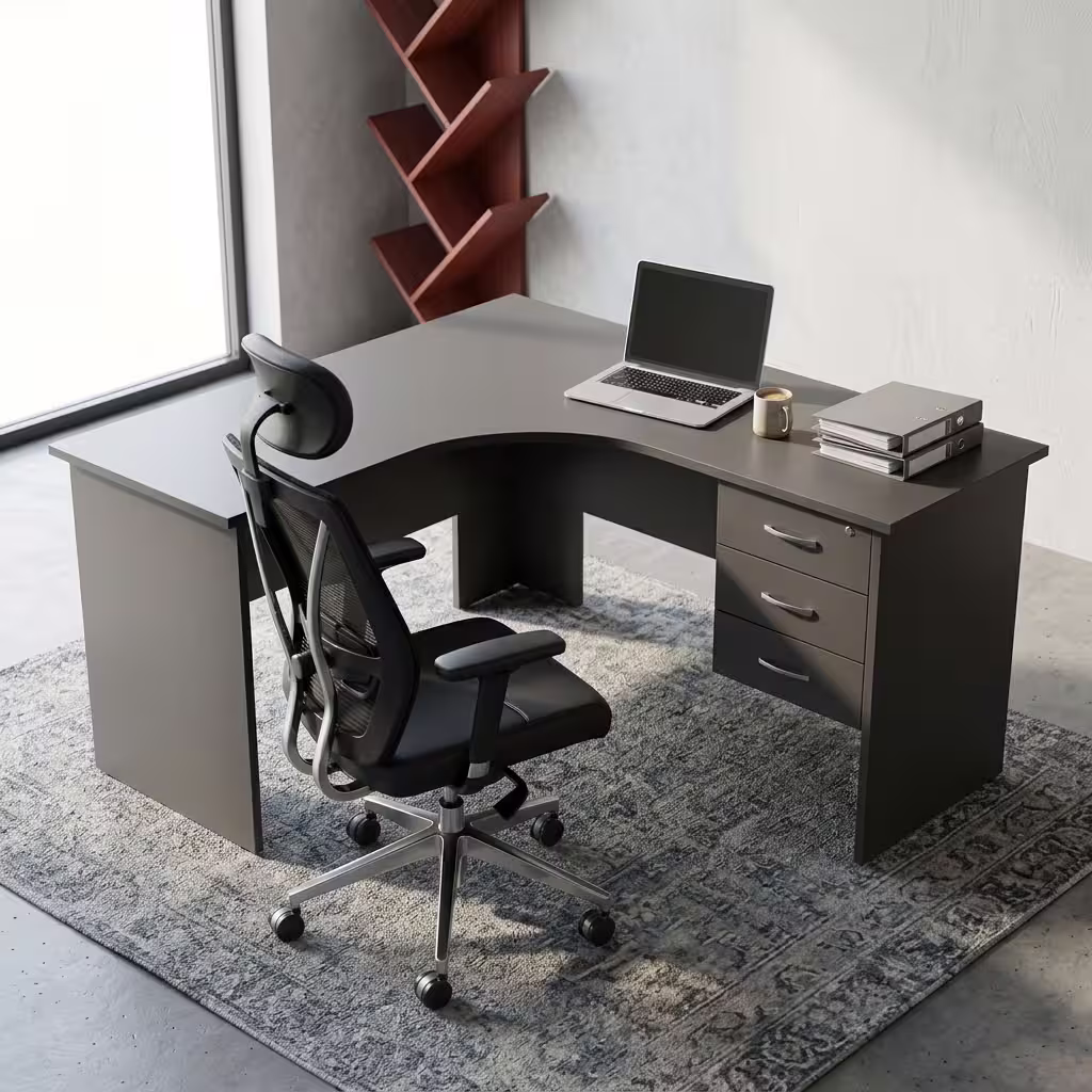 Dark grey 1200mm L-Shaped Office Desk with a built-in lockable three-drawer pedestal and a laptop on top.