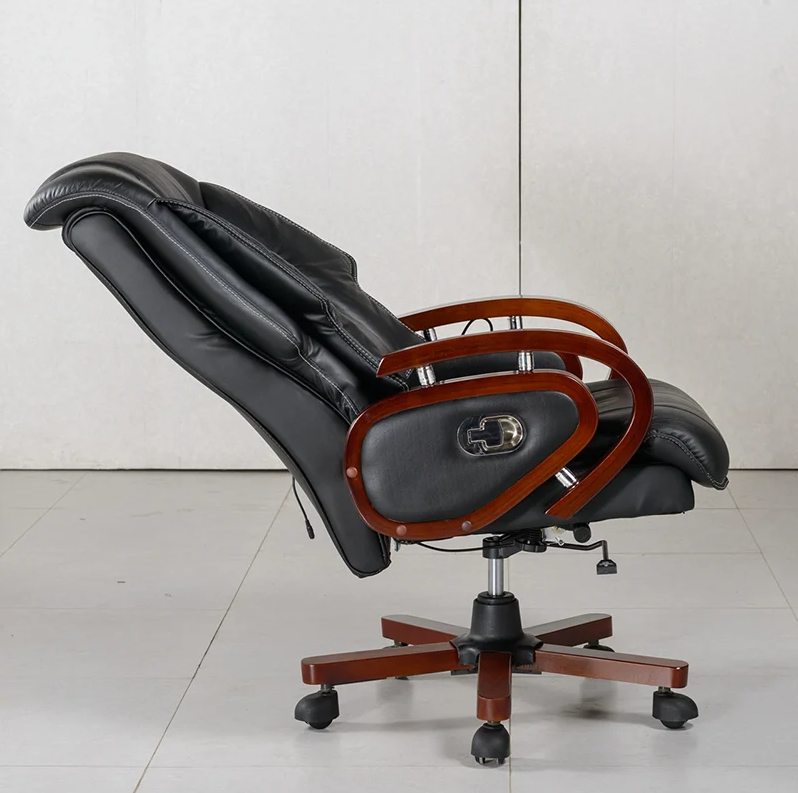 Boss executive office chair with wooden arms, leather upholstery, and recliner function