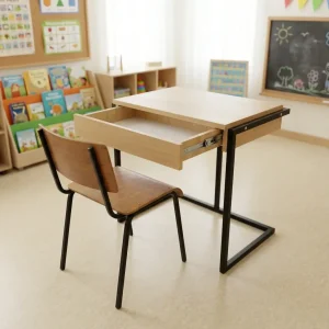 Wooden student study desk set with a light oak tabletop, an open sliding drawer, a matching wooden school chair, and a geometric black steel frame.