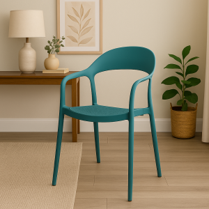 Blue bistro plastic chair with curved armrests in a modern indoor setting.