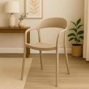Beige bistro plastic chair with armrests in a modern indoor café setting.