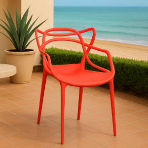 A vibrant red bistro plastic chair placed on a stylish patio café with coastal background and modern décor.
