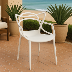 Ivory bistro plastic chair with elegant curved backrest in a stylish patio café setup.