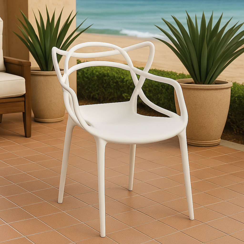 Ivory bistro plastic chair with elegant curved backrest in a stylish patio café setup.