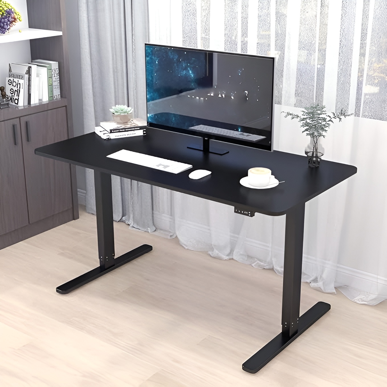 Electric height adjustable standing desk with black tabletop and metal frame
