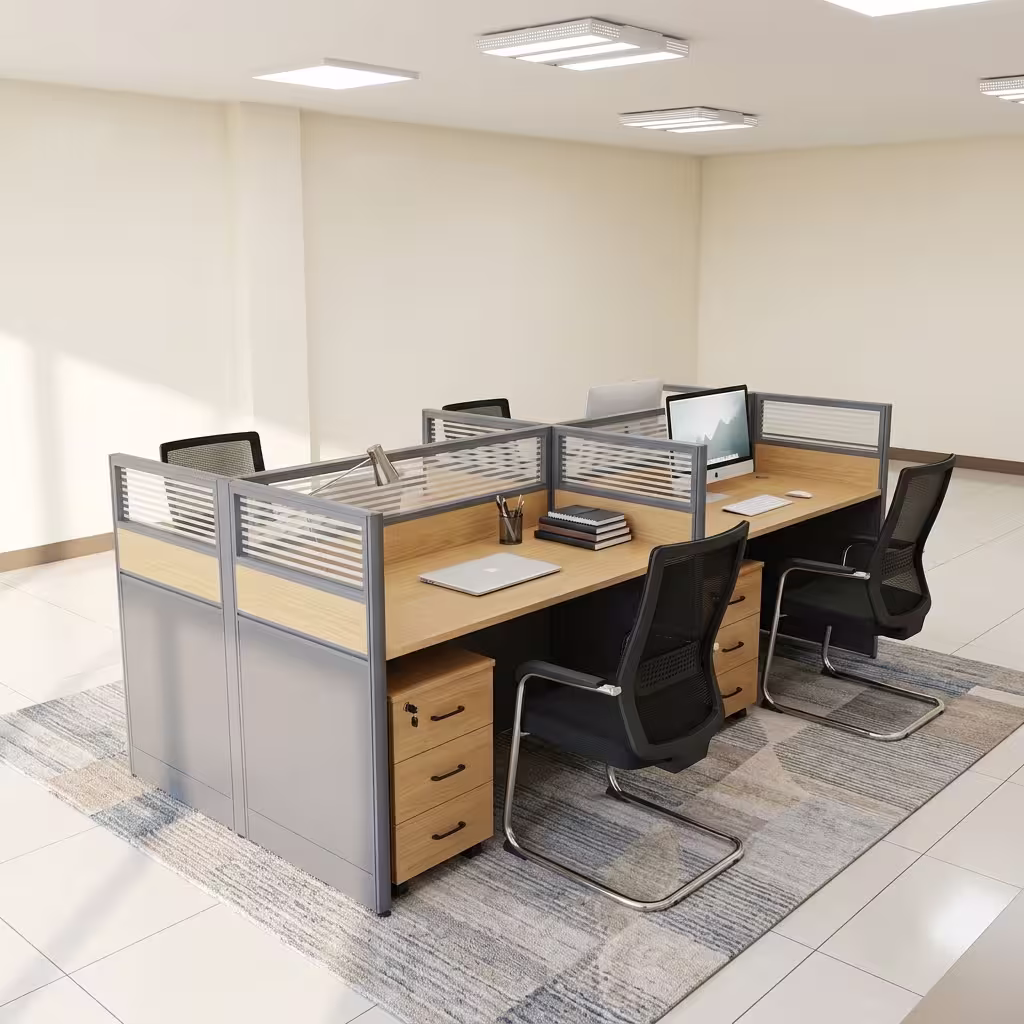 A 4-Seater Office Workstation featuring light oak-laminated desk surfaces, charcoal privacy divider screens with slatted frosted glass tops, and 3-drawer pedestals.