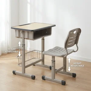 Adjustable children study set in a taupe finish featuring a rectangular desktop with an open storage cubby, a slatted backrest chair, and a steel frame.