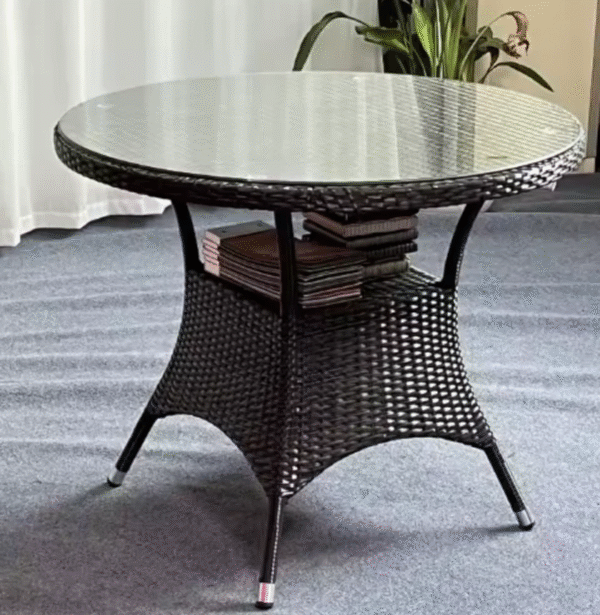 Outdoor Rattan Dining Set with round glass table and four patio chairs