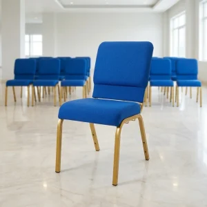 Blue fabric stackable chair featuring a thick padded seat, cushioned backrest, and a sturdy square-tube steel frame with a polished gold finish.