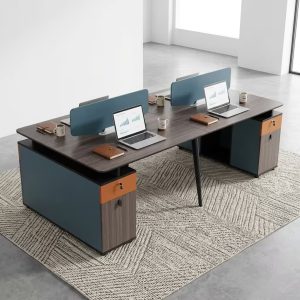 4-Person Office Computer Desk with dark wood-grain desktop, blue privacy divider panels, integrated storage cabinets, orange drawer fronts and grey wood-grain doors.