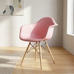 Pink shell arm chair with wooden legs and curved seat