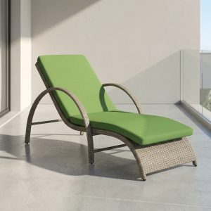 Oasis outdoor lounger with bed and green cushions