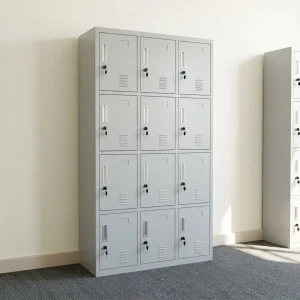12-Door Staff Locker Cabinet in light gray metal with twelve lockable doors, recessed handles, ventilation slots and four rows of compartments.