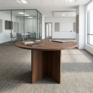 1m Custom Round Meeting Table with circular walnut wood-finish tabletop, smooth rounded edges, visible wood grain and cross-panel pedestal base.