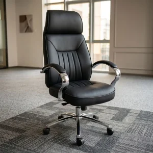 High Back Leather Executive Chair with black padded upholstery, integrated headrest, contoured backrest, chrome armrests and five-star caster base.