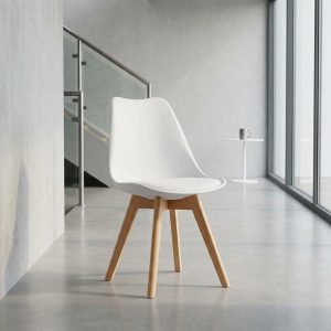 White Nordic shell dining chair with wooden legs