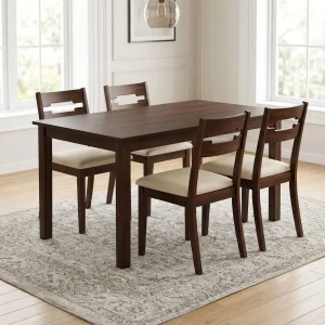 Rectangular dark espresso wood dining table paired with four matching wooden chairs featuring cream-colored upholstered fabric seat cushions.