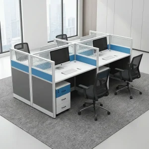 A 4 Seater Office Cubicle Desk featuring white desk surfaces, blue and grey privacy dividers with frosted slatted glass tops, and four matching pedestals.
