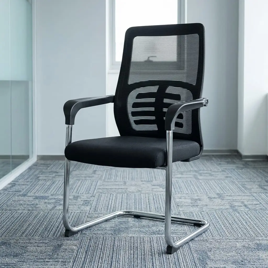 A Black Mesh Visitor Office Chair featuring a black mesh backrest with a geometric lumbar pattern, padded armrests, and a polished chrome cantilever base.