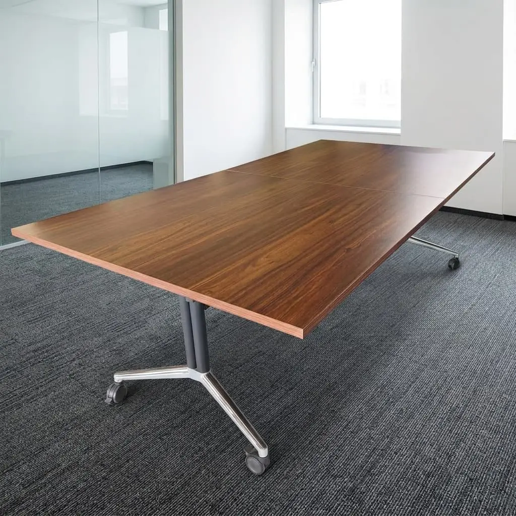 A 2400mm Mobile Boardroom Table featuring a walnut wood grain top, heavy-duty black folding T-legs, polished chrome bases, and lockable caster wheels.