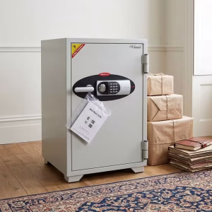 A 122kg Diplomat Office Safe featuring a tall cream-colored steel body, external barrel hinges, an electronic digital keypad, and a chrome turning handle.
