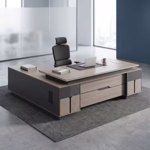 A 2.4M Executive L-Shaped Desk featuring a textured wood grain floating desktop, a dark charcoal base, built-in lockable drawers, and an integrated side return cabinet.