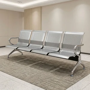 A 4 Seater Metal Waiting Room Chair featuring a linked row of four perforated silver steel seats, built-in end armrests, and polished chrome arched legs.