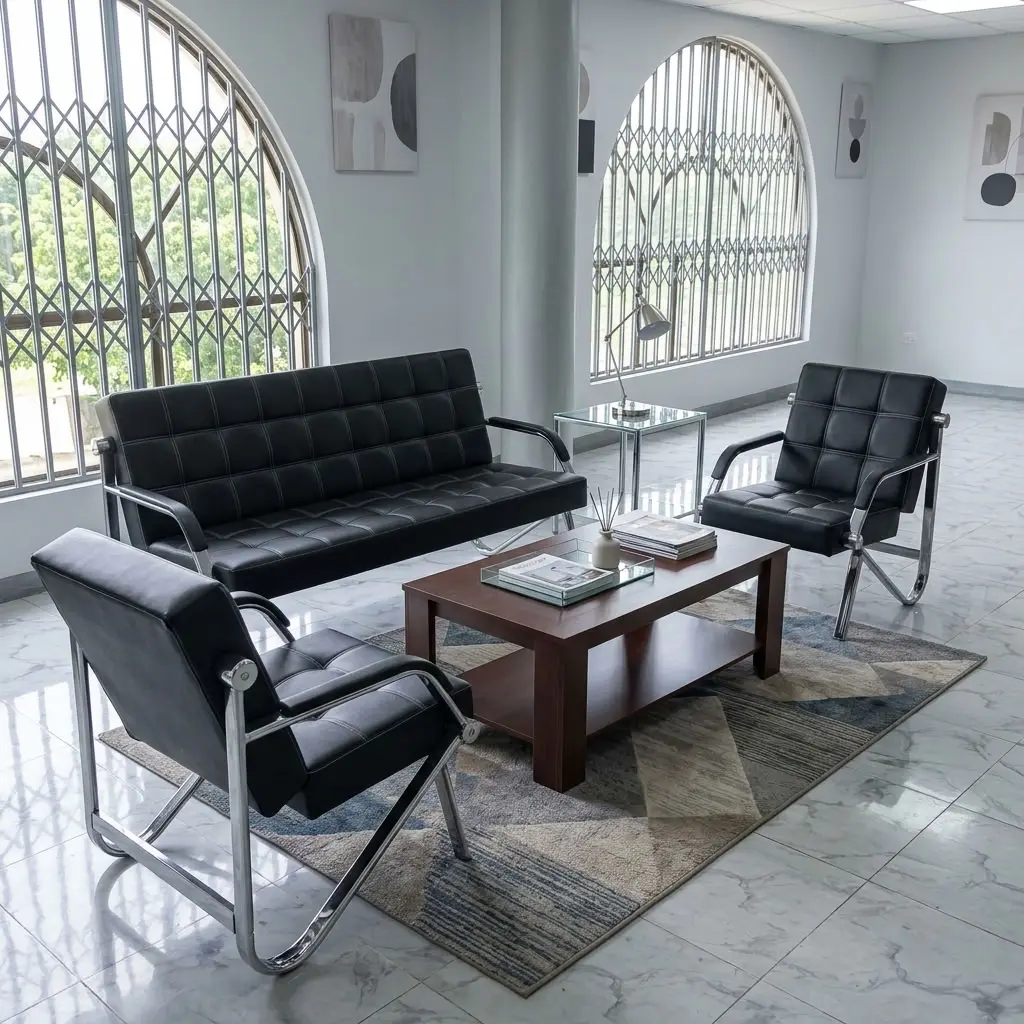 A 5-Seater Reception Guest Sofa set featuring a black grid-tufted three-seater sofa, two matching single armchairs, and polished chrome cantilever frames.