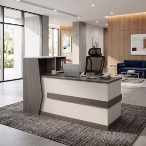 A 2m Wooden Reception Desk featuring a textured grey timber finish, clean white front accent panels, a tiered L-shaped guest counter, and an integrated side return shelf.