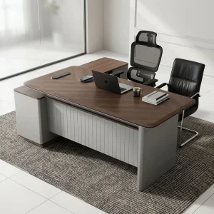 A 1.8m Fluted Modesty Executive Desk featuring a walnut wood top, an integrated side return cabinet, a grey fluted modesty panel, and built-in desktop tech ports.