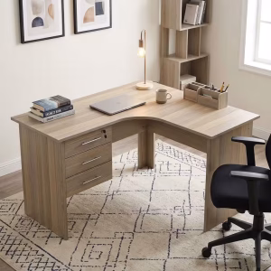 A 1.2M Curved Office Desk in a light oak wood grain finish featuring an L-shaped corner top, an integrated lockable three-drawer pedestal, and matching support legs.