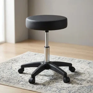 A premium black Swivel Adjustable Stool featuring a thick round cushioned seat pan, a polished chrome gas lift column, and a heavy-duty black five-star wheeled base