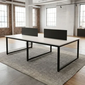 4-Seater Custom Office Workstation with white rectangular desktops, black metal frame, central privacy divider panels, and four individual working spaces.