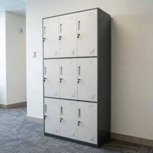 9-Door Metal Staff Locker Cabinet with gray metal frame, nine light gray lockable doors, recessed handles, and ventilation openings.