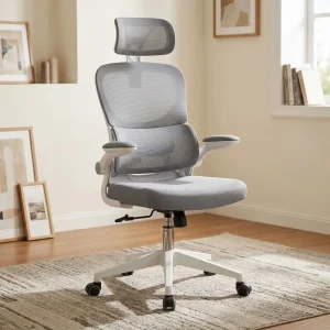 High-back grey mesh office chair with an adjustable headrest, flip-up padded armrests, a white five-star swivel base, and black dual-wheel casters.