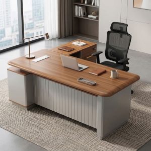 1.6m Smart Office Desk with light woodgrain rounded tabletop, built-in electrical outlets and USB ports, gray grooved modesty panel, side storage shelves, two drawers, gold-tone handles and combination lock.