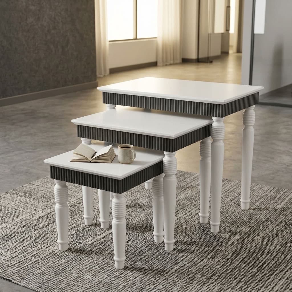 Premium Nesting Tables Set featuring three graduated rectangular white tabletops, dark grey ribbed apron panels, and decorative white turned legs.