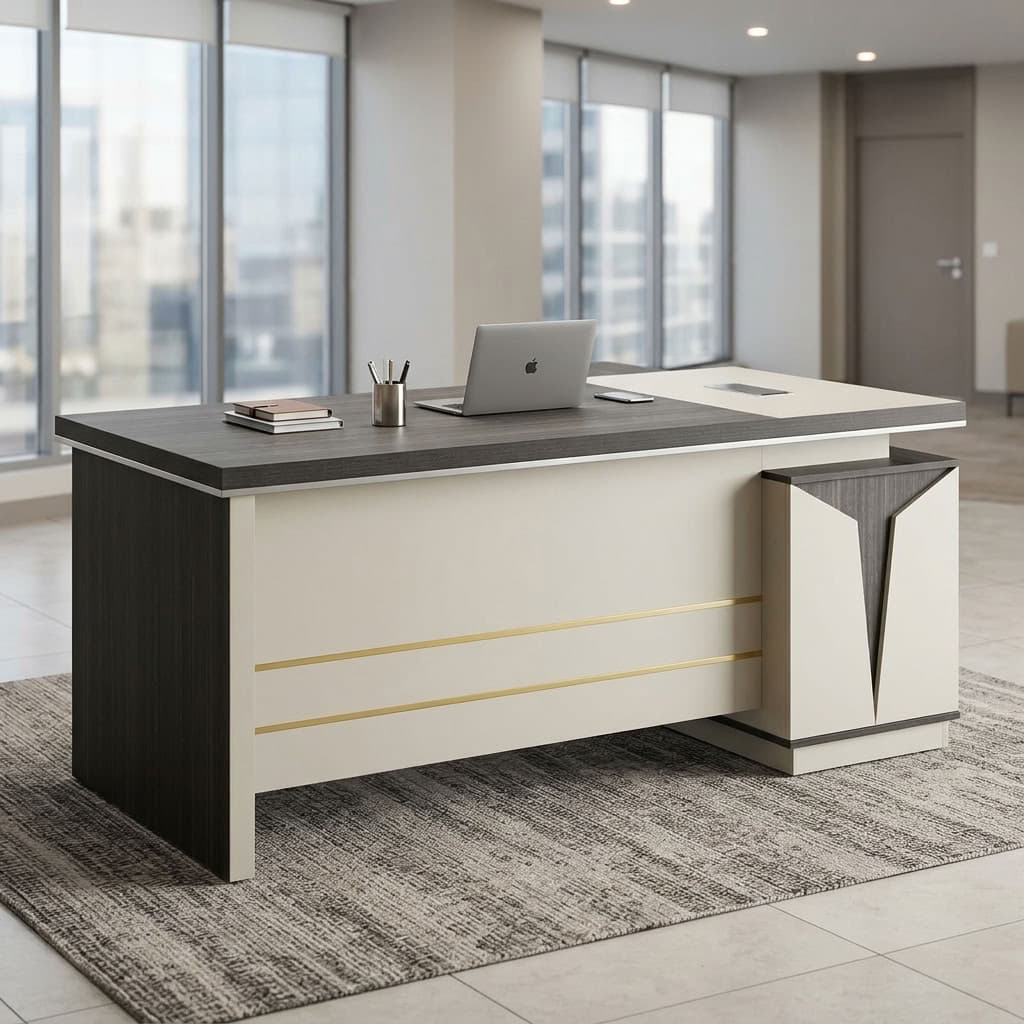 1.8m Manager Office Desk with dark gray wood-grain tabletop, white front modesty panel, gold-tone horizontal accents, L-shaped side return, and matching angular side cabinet.