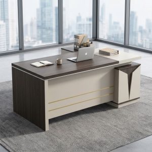1.8m Manager Office Desk with dark gray wood-grain tabletop, white front modesty panel, gold-tone horizontal accents, L-shaped side return, and matching angular side cabinet.