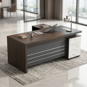 Premium 1.8m Executive Desk with dark wood-grain tabletop, charcoal gray L-shaped side return, marble-look three-drawer cabinet, and front modesty panel with horizontal metallic-look accents.